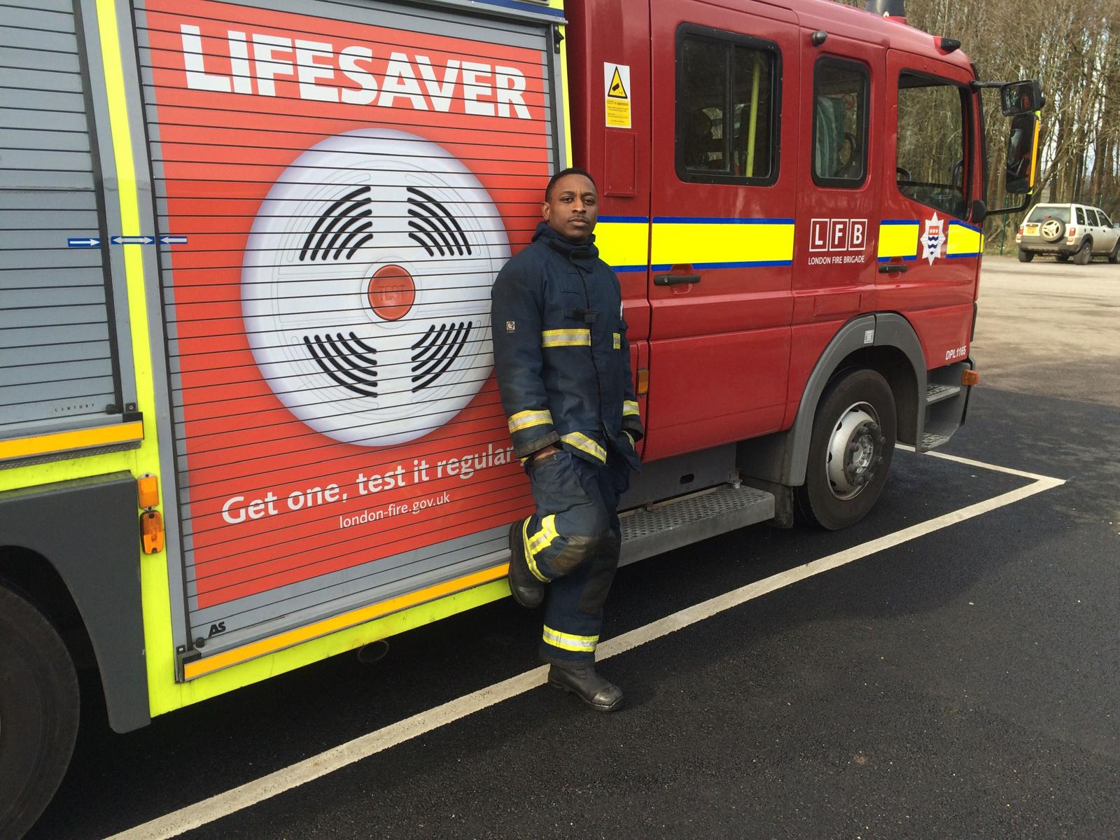 John Balogun in firefighter uniform