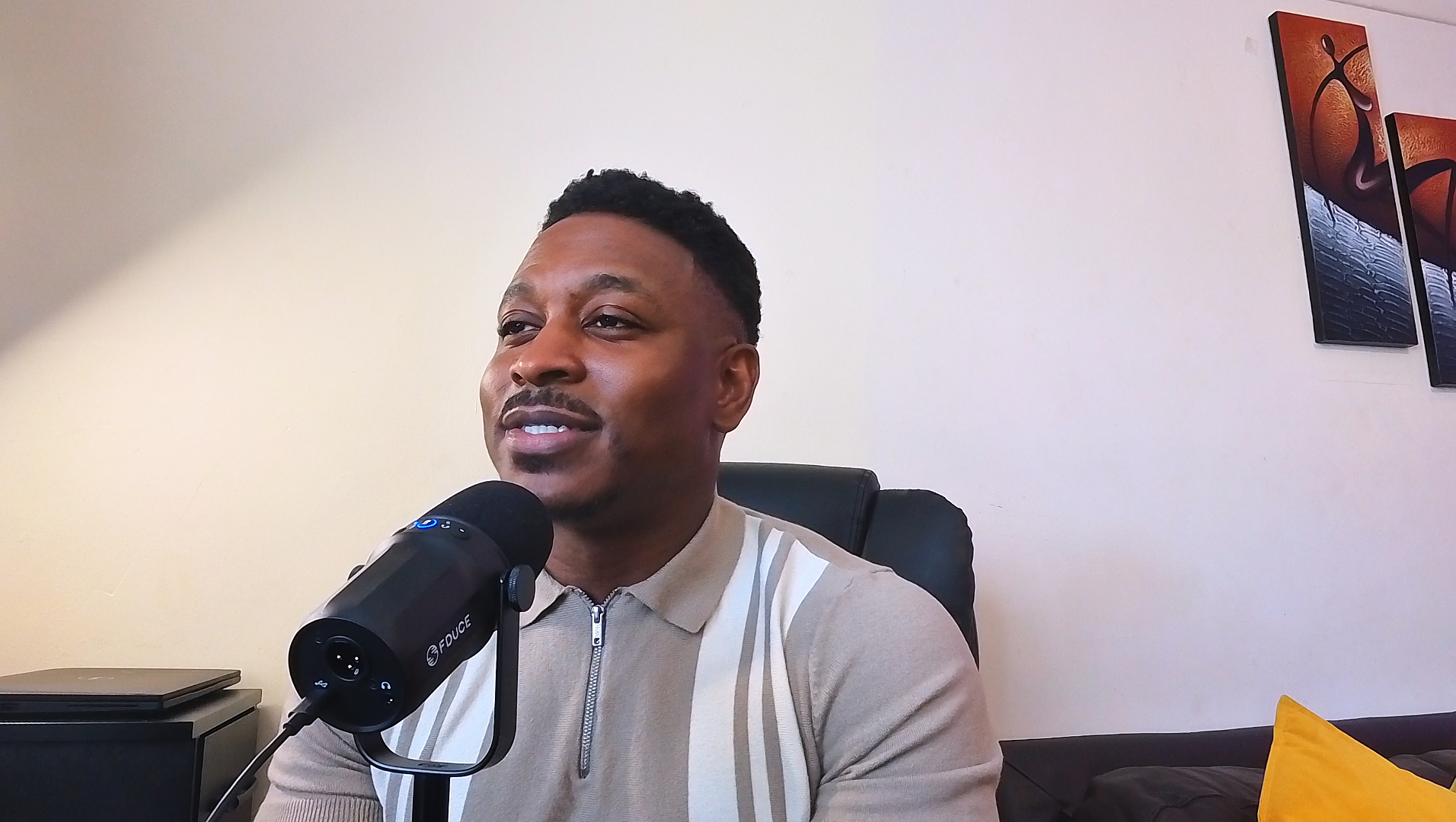 John Balogun recording podcast